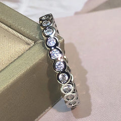 925 Sterling silver Single Row Pave AAAAA cz Eternity Promise ring Engagement Wedding close-up view