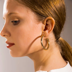 Big Round Stainless Steel Hoop Earrings | Minimalist Gold Circle Earrings for Women a alternate view