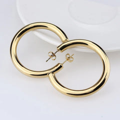 Big Round Stainless Steel Hoop Earrings | Minimalist Gold Circle Earrings for Women an close-up view