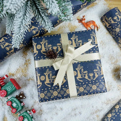 Navy Blue Kraft Christmas Wrapping Paper Roll | Snowflake, Floral and Reindeer Design detail view