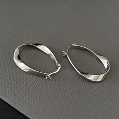 Geometric Twisted Hoop Earrings | Niche Design Statement Jewelry for Women detail view