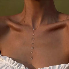Simple Transparent Water Drop Clavicle Chain Thin Rope Beaded Tassel Earrings Necklace close-up view