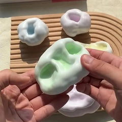 Shapeable Vacuum Grape Stress Ball | Squishy Sand Toy with Sound for Sensory Relief close-up view