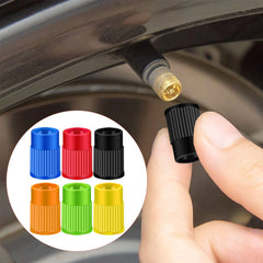 Plastic Tire Valve Caps Built-in Valve Core Remover Tool Universal Stem Covers for Car close-up view