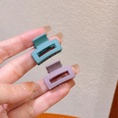 20 Pcs/bag Solid Color Matte Hollow Hair Claw Clip Candy Color Catch Barrettes Stylish close-up view