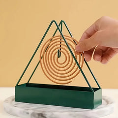 Triangle Mosquito Mat Stand | Simple Iron Holder for Indoor Rooms close-up view