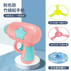 Glowing Bamboo Dragonfly Toy | Rotating Flash Frisbee with Shooting Gun close-up view