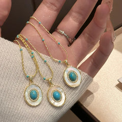 Natural Turquoise Oval Shell Pendant Necklace | Gold Chain Collarbone Jewelry detail view