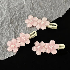 Jelly Cherry Blossom Hair Clips Pink Blue Flower Hairpins for Girl Romantic Wave Side close-up view