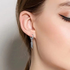 Cross Feather Stud Earrings Set | Unisex Stainless Steel Punk Jewelry close-up view