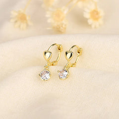 Luxury Golden Heart Earrings Small Exquisite Elegant Clip-On Earrings For Women Tragus close-up view
