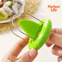 Fast Fruit Kiwi Cutter Peeler Slicer Kitchen close-up view