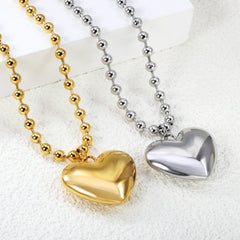 ASONSTEEL Romantic Heart Pendant Necklace | Gold Stainless Steel Choker for Women Gift close-up view
