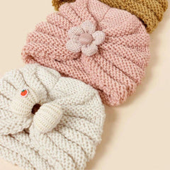 Baby Crochet Turban Hat with Flower Decor | Winter Warm Knit Headwrap for Infant Girls close-up view