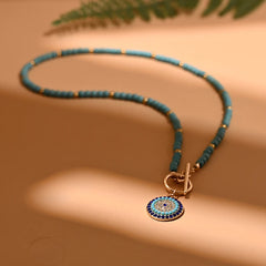 Colorful Stone Choker Necklace | Round Evil Charm Pendant for Women close-up view