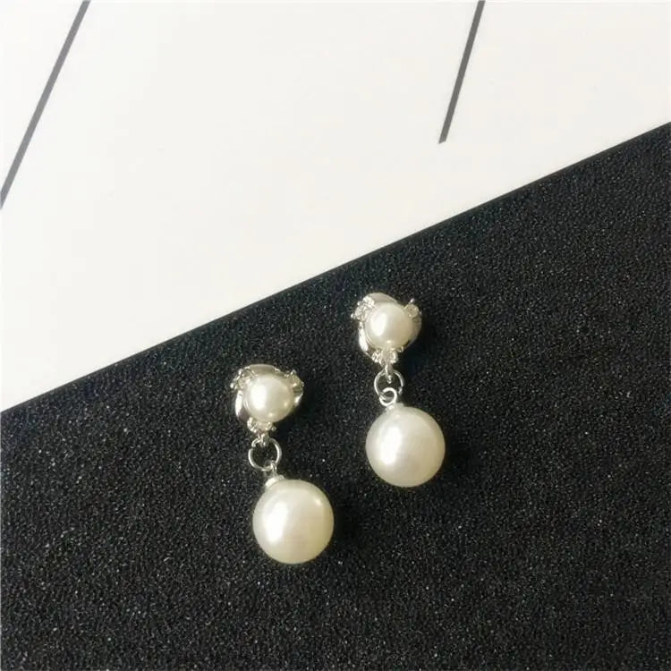Wild Simple Pearl Bean Earrings additional angle