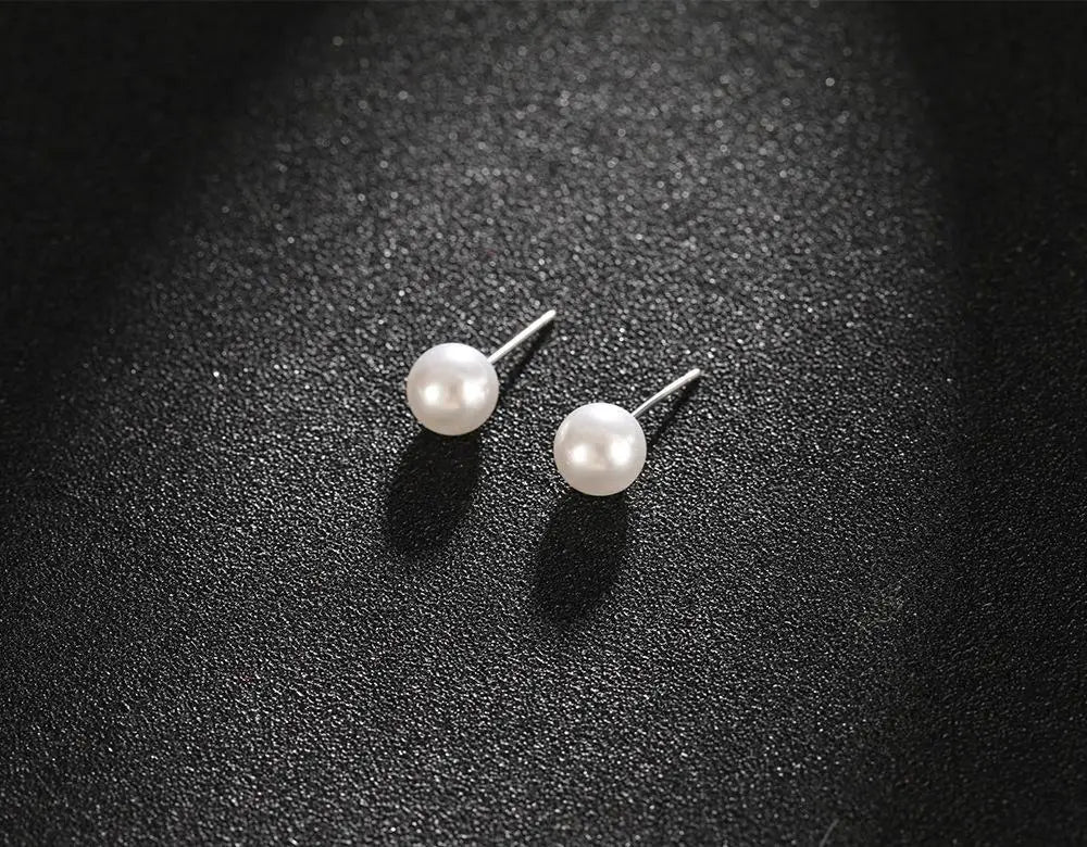 Wild Simple Pearl Bean Earrings detail view