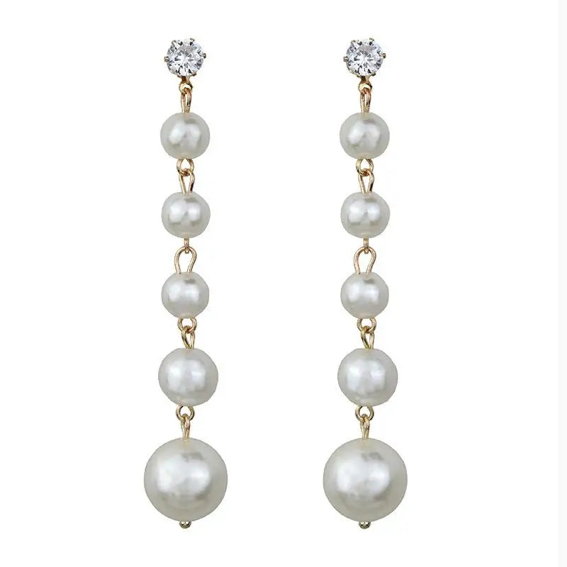 Wild Simple Pearl Bean Earrings lifestyle view