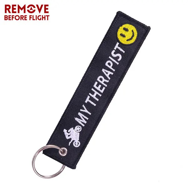 Motorcycle Keychain with Embroidery | Real Men Like Curves Keyring close-up view
