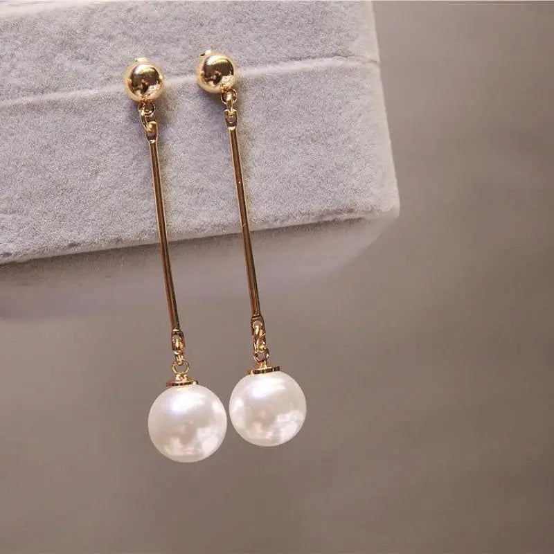 Wild Simple Pearl Bean Earrings detail view