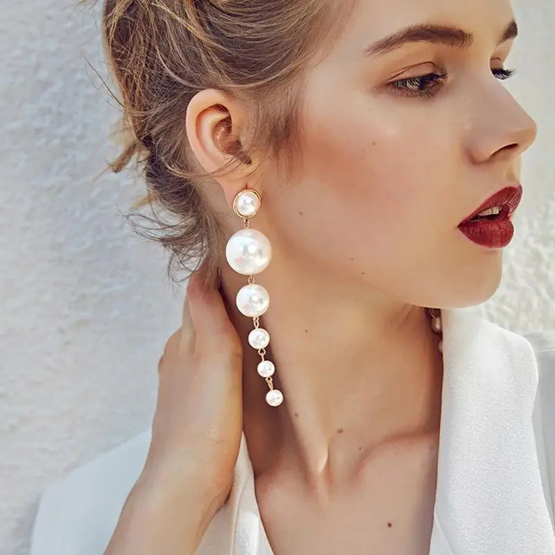 Wild Simple Pearl Bean Earrings additional angle