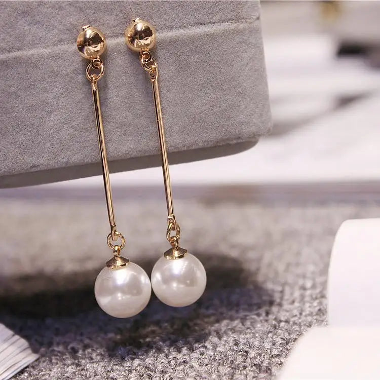 Wild Simple Pearl Bean Earrings detail view