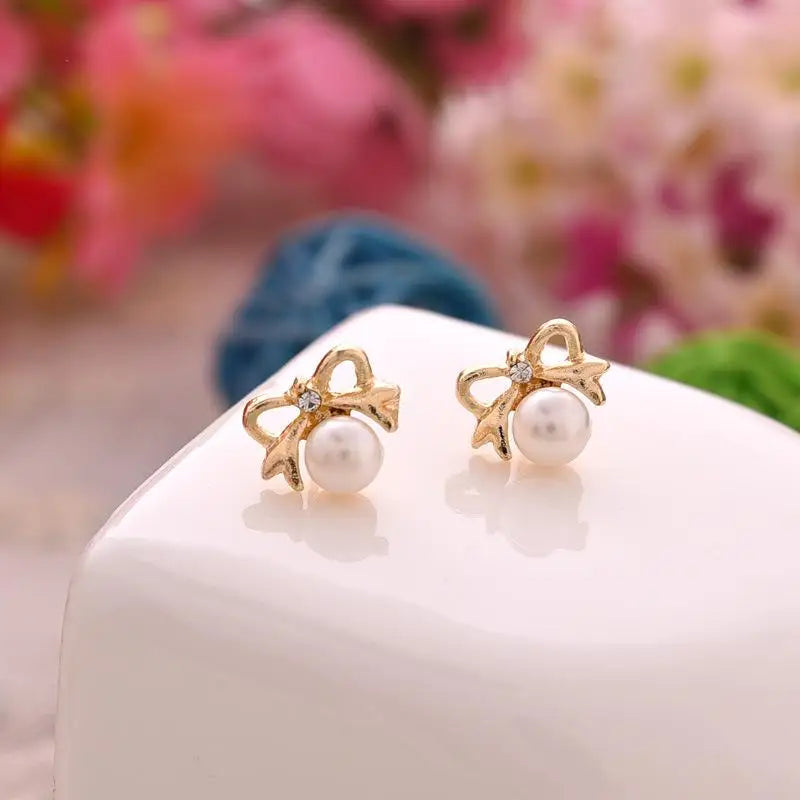 Wild Simple Pearl Bean Earrings lifestyle view