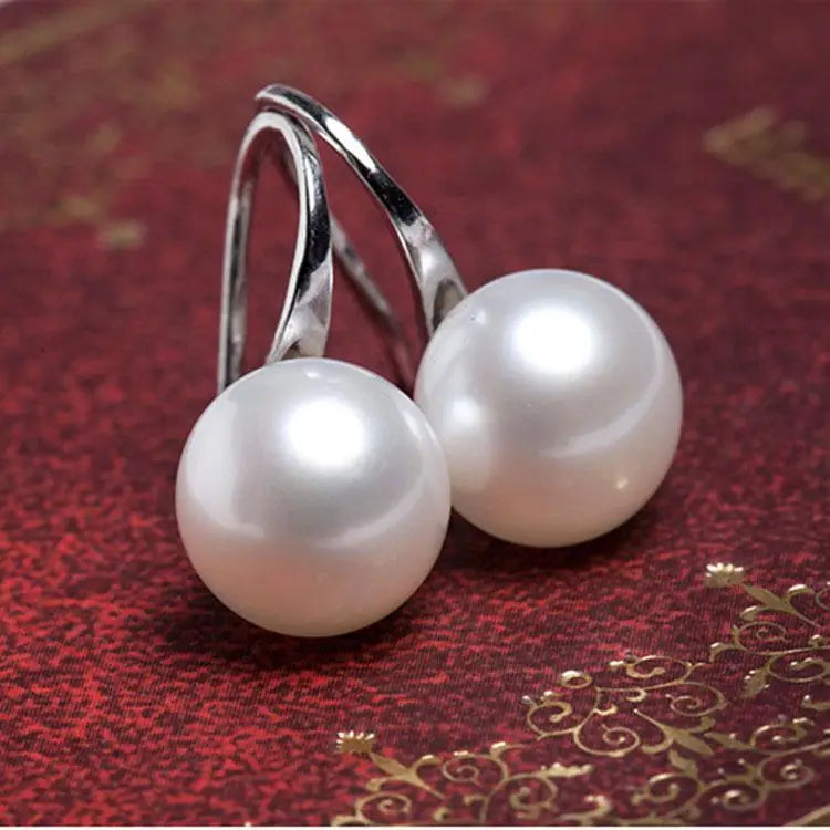 Wild Simple Pearl Bean Earrings detail view