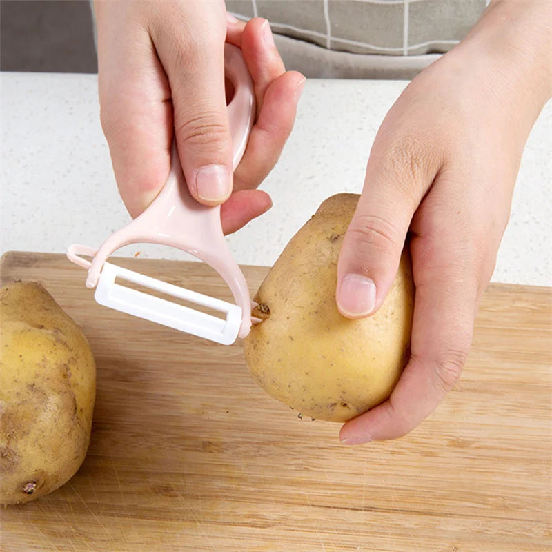 LMETJMA Ceramic Peeler 4 Color Vegetable Fruit Peeler Kitchen Potato Carrot Cucumber lifestyle view