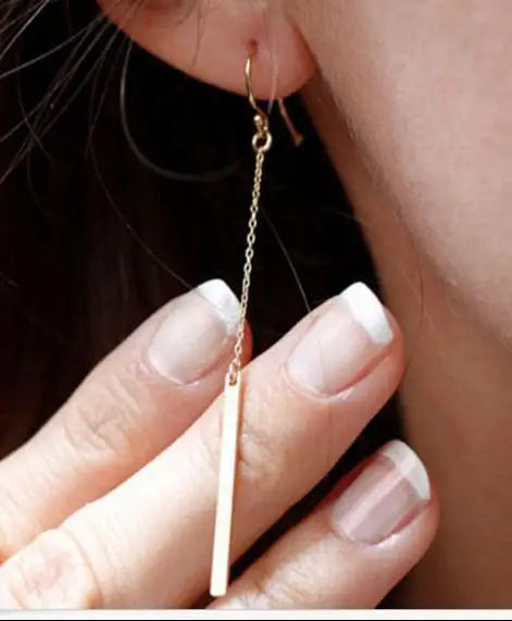 Wild Simple Pearl Bean Earrings close-up view