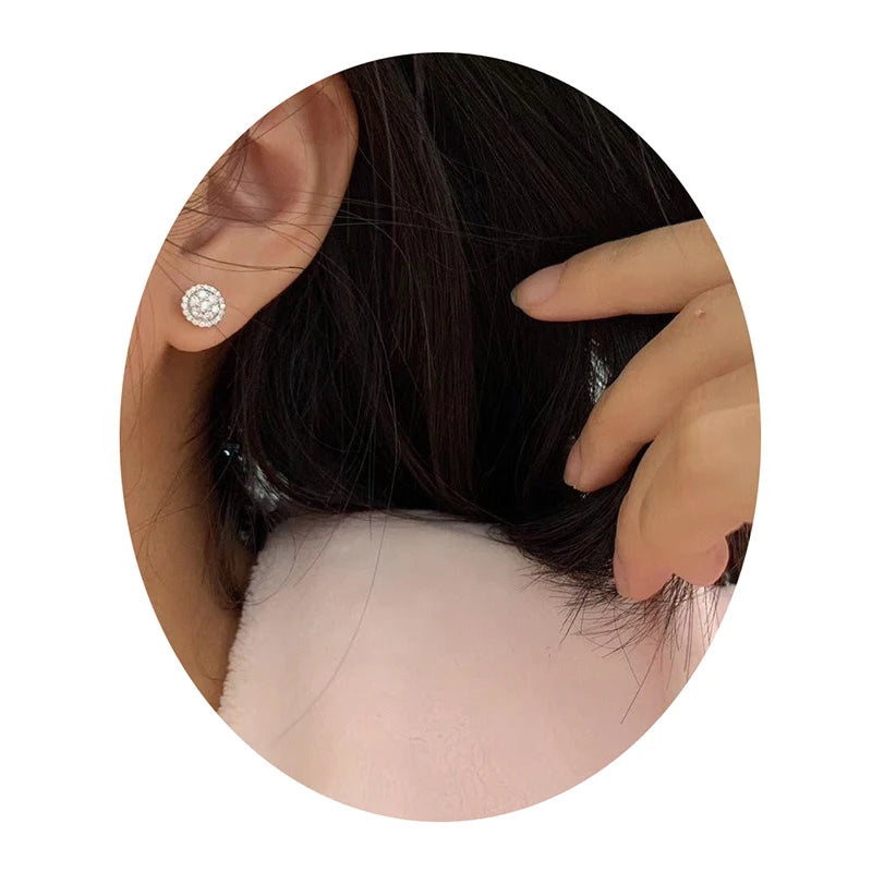 Dainty Round Cubic Zirconia Stud Earrings for Women | Classic White CZ Push-Back Earri close-up view