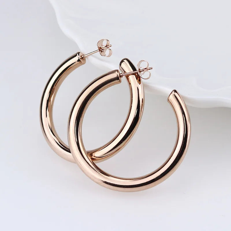 Big Round Stainless Steel Hoop Earrings | Minimalist Gold Circle Earrings for Women a lifestyle view