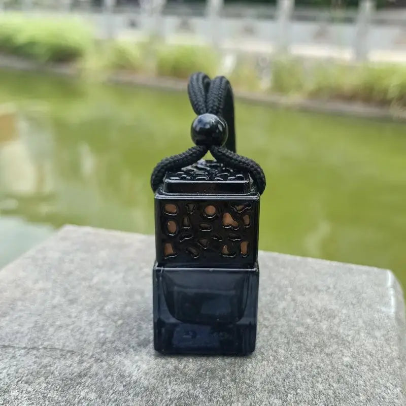 Square Glass Car Essential Oil Diffuser Pendant close-up view