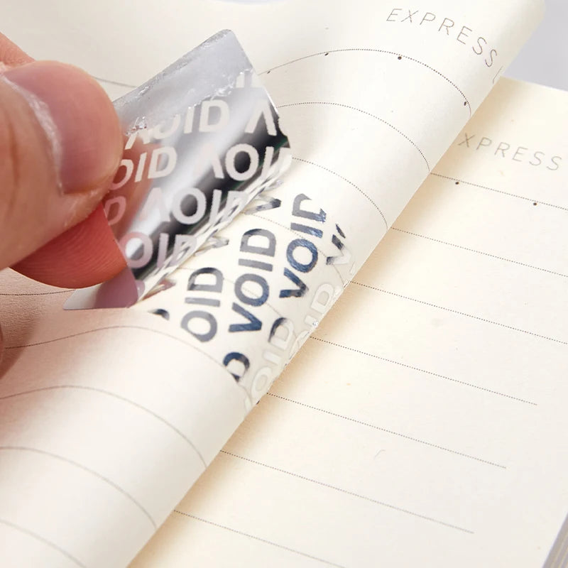 Tamper Proof Void Labels | Disposable Security Seal Stickers close-up view
