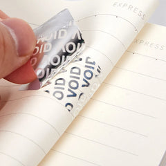 Tamper Proof Void Labels | Disposable Security Seal Stickers close-up view