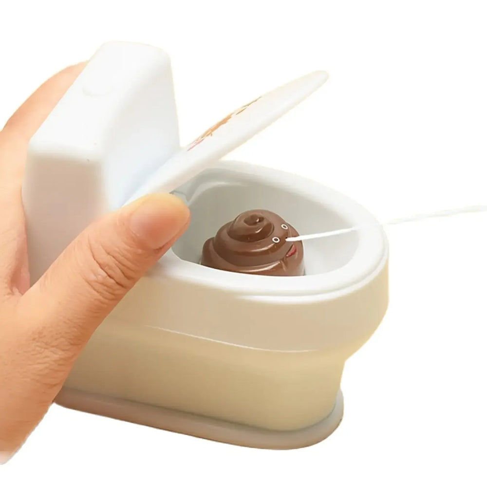 1PC-Novel Interesting Poop Spray Prank Toy Joke Cary Toys Mini Sprinkler Toilet Spray lifestyle view