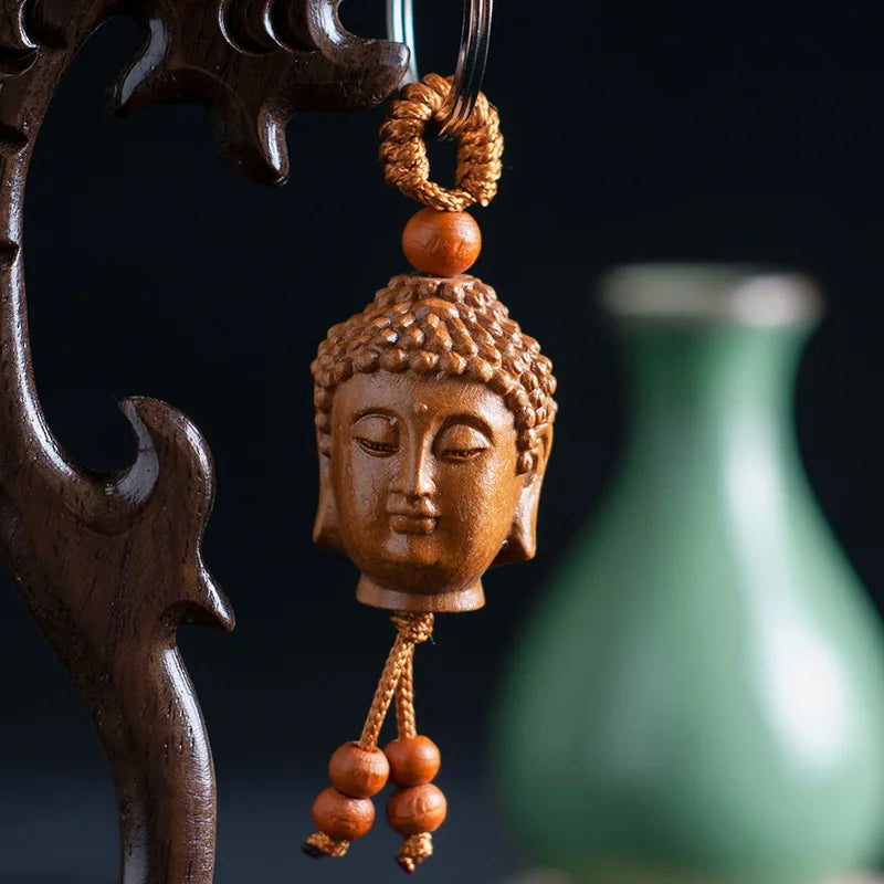 Buddha Head Carved Wood Keychain | Peach Wood Key Ring additional angle