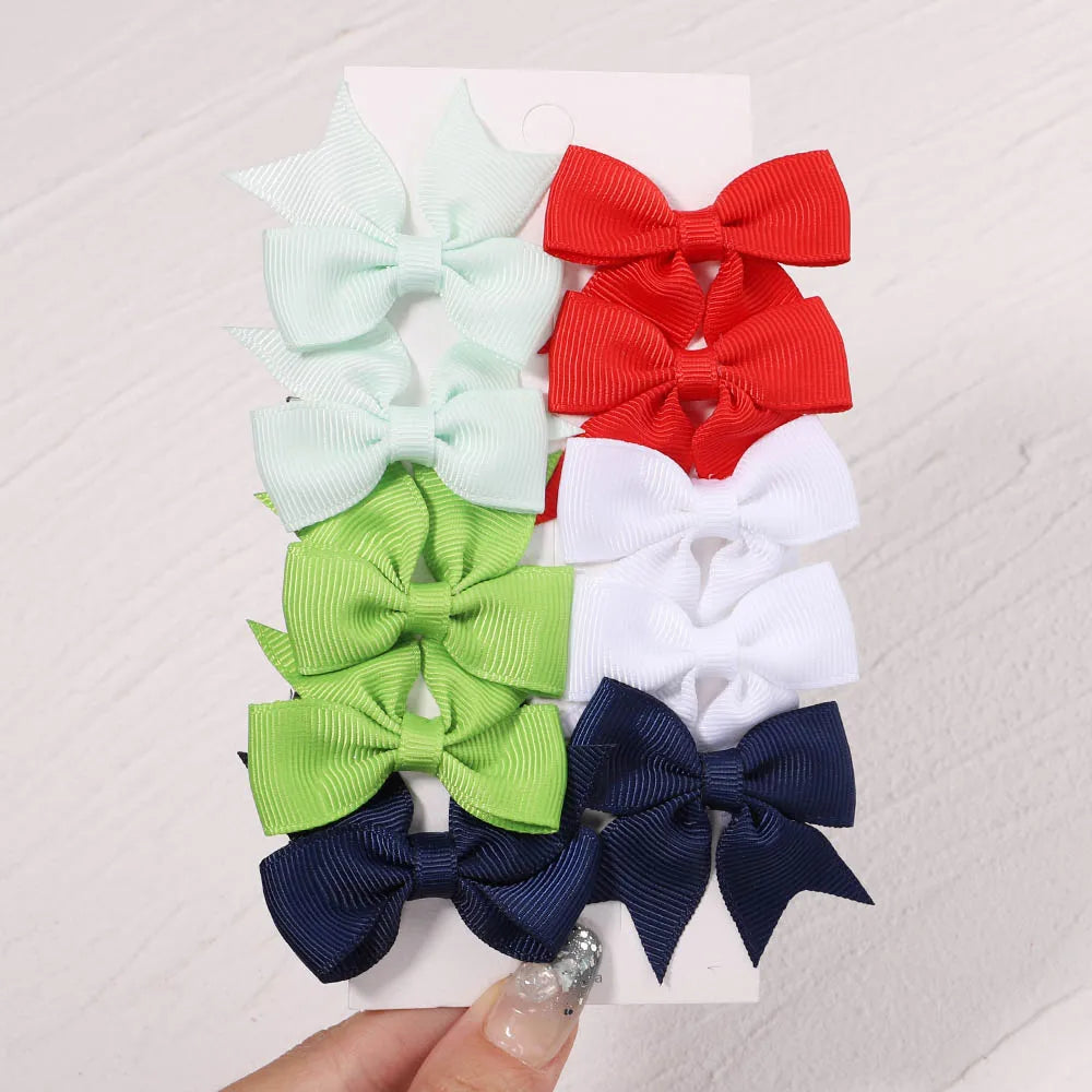 10Pcs/Set New Cute Solid Ribbon Bowknot Hair Clips for Baby Girls Handmade Bows Hairpi close-up view
