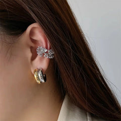CARLIDANA Connected Double Ring CC Shape Gold Earrings | Stainless Steel PVD Gold Plated detail view