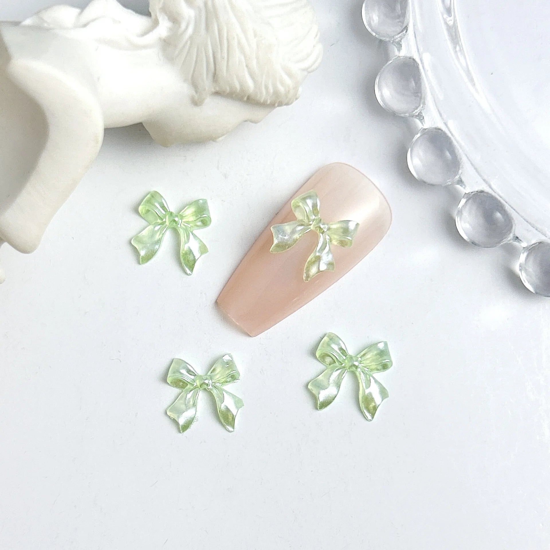 50pcs 3D Sweet Pearly Glossy Ribbon Bow Resin Nail Charms Ballerina Bow Tie Nail Art lifestyle view