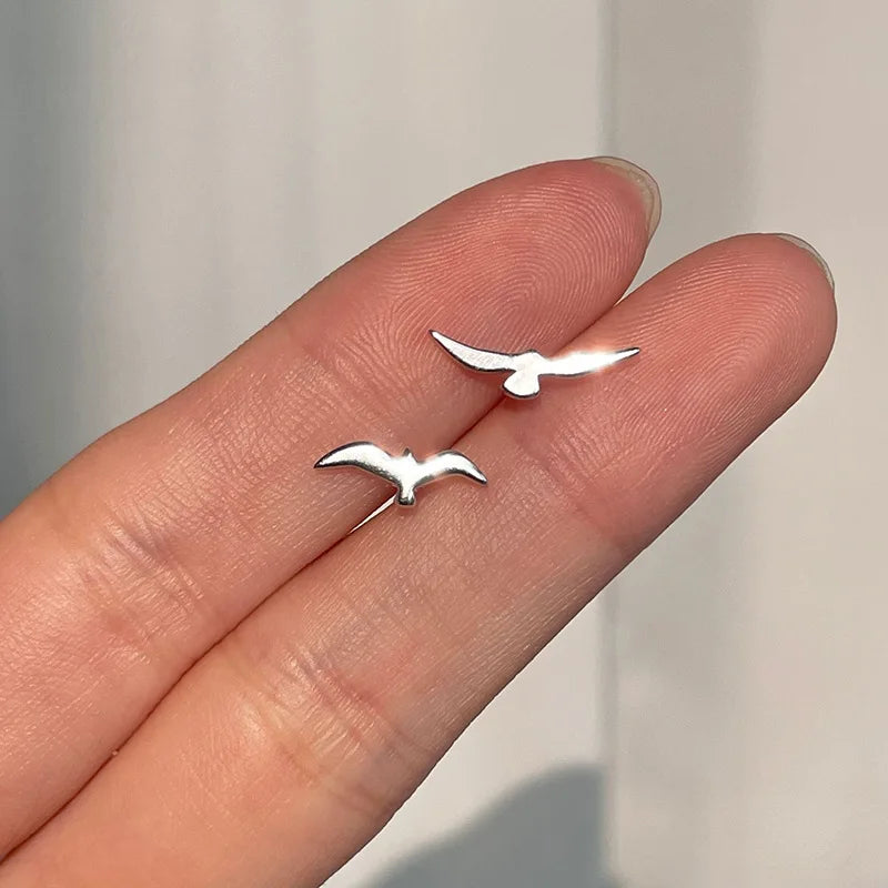 Asymmetrical Small Seagull Earrings Delicate Stylish 925 Silver Earrings Minimalist a lifestyle view