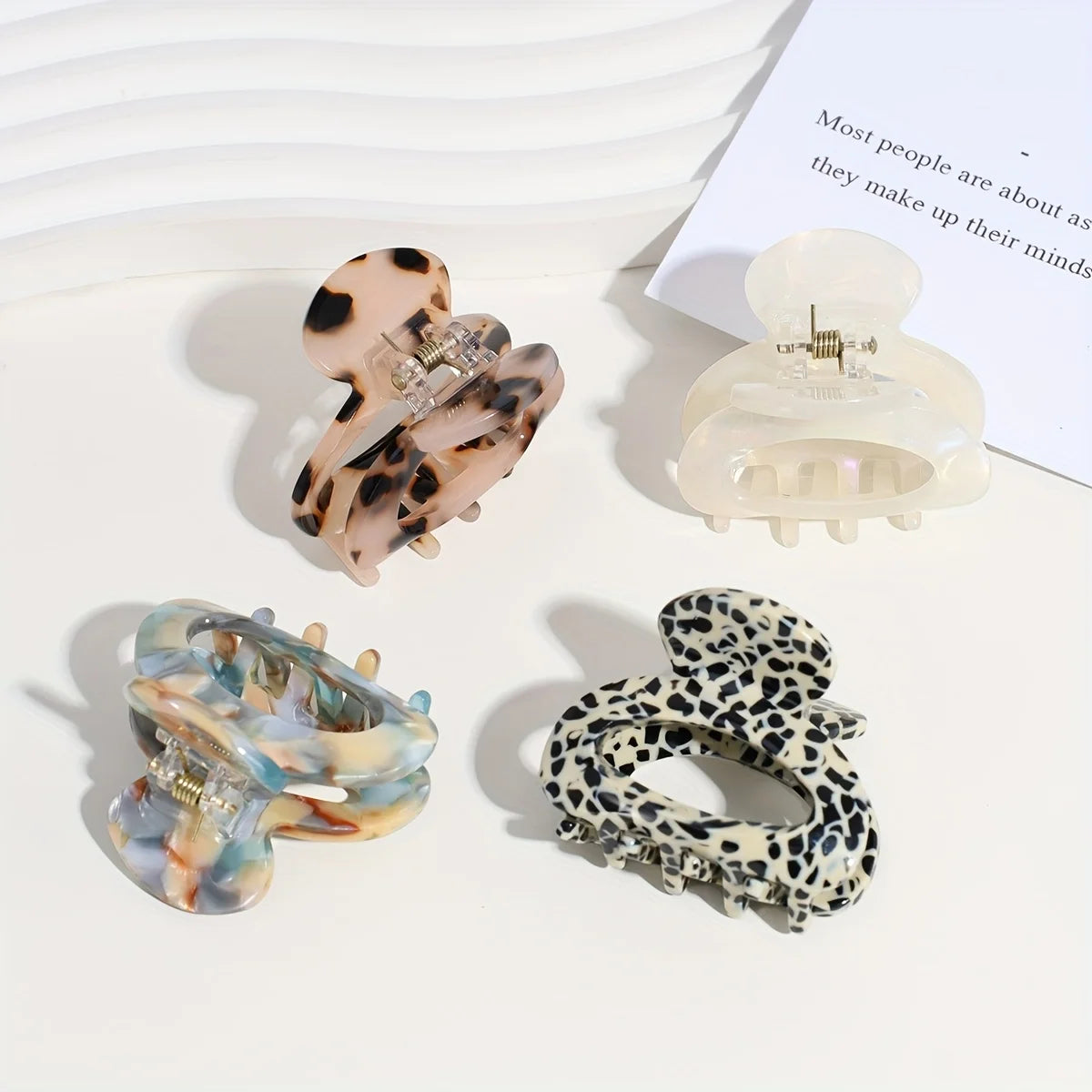 Elegant Sweet Small Oval Hair Claw Clip for Women Secure Grip Hair Accessories Ponytai close-up view