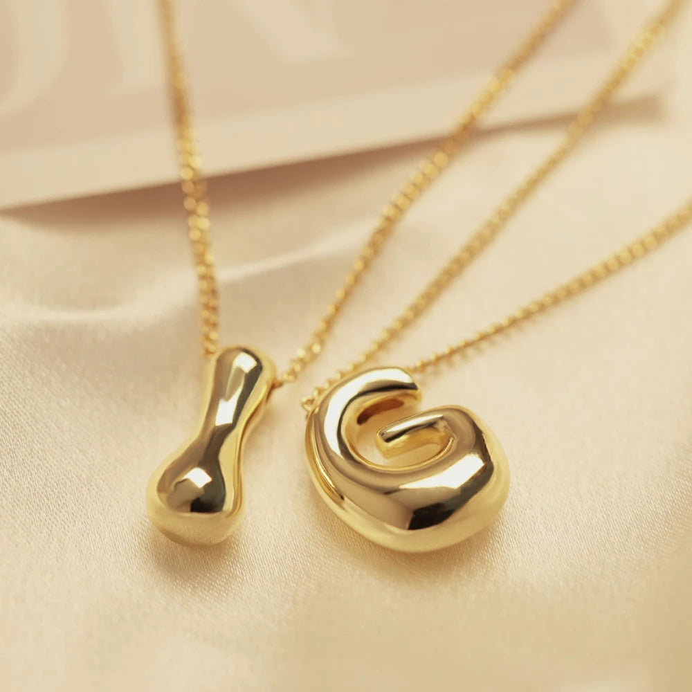Golden Initial Necklace | Chunky Bubble Letter Pendant for Women close-up view
