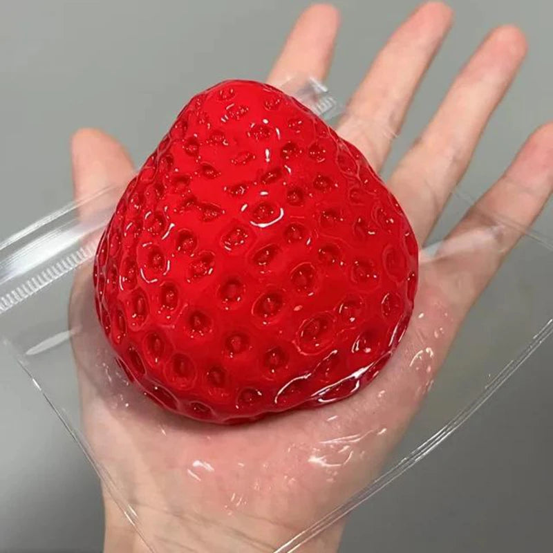 Strawberry Taba Squishy Toy | Slow Rebound Stress Relief Fidget for Kids and Adults lifestyle view