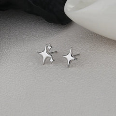 VENTFILLE Gold Star Stud Earrings | Asymmetrical 925 Silver Fashion Jewelry for Women close-up view