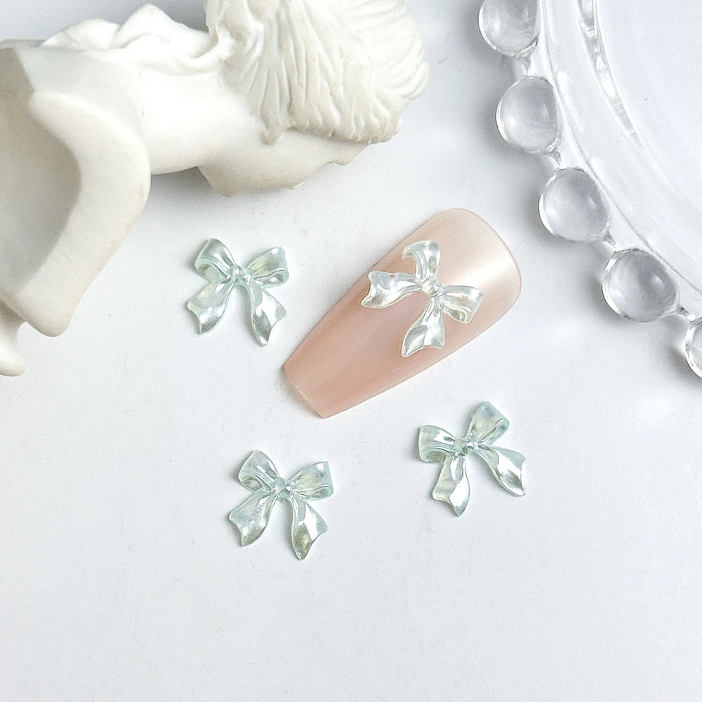 50pcs 3D Sweet Pearly Glossy Ribbon Bow Resin Nail Charms Ballerina Bow Tie Nail Art lifestyle view