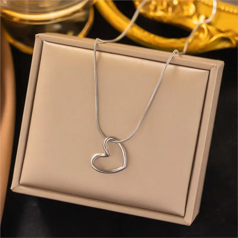ANENJERY Stainless Steel Twist Hollow Heart Pendant Necklace | Trendy Clavicle Chain alternate view
