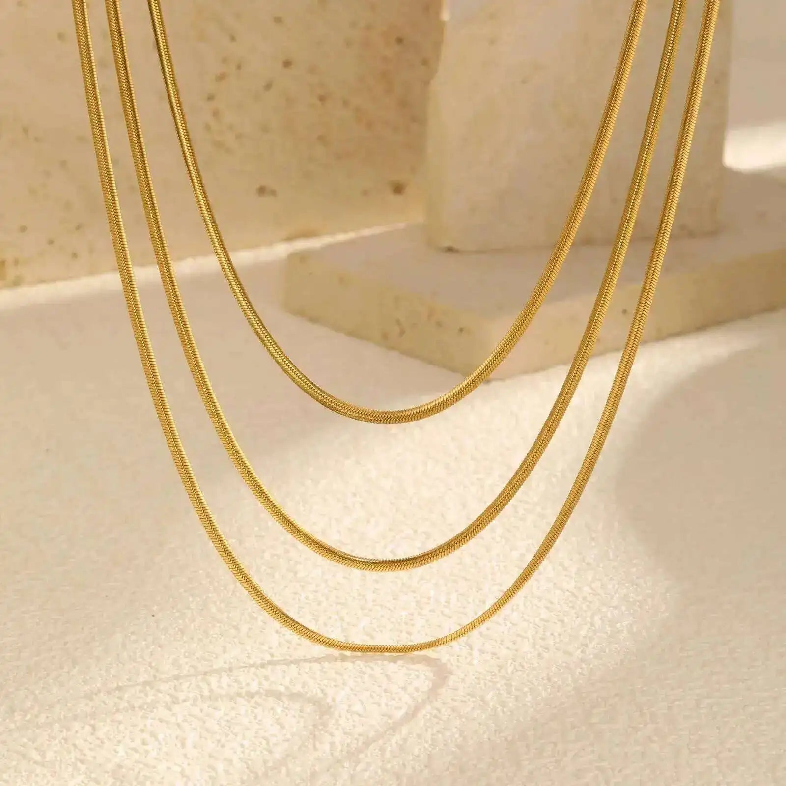 Waterproof Layering Necklaces for Women,stainless Steel Triple Stacked Snake Clavicle close-up view