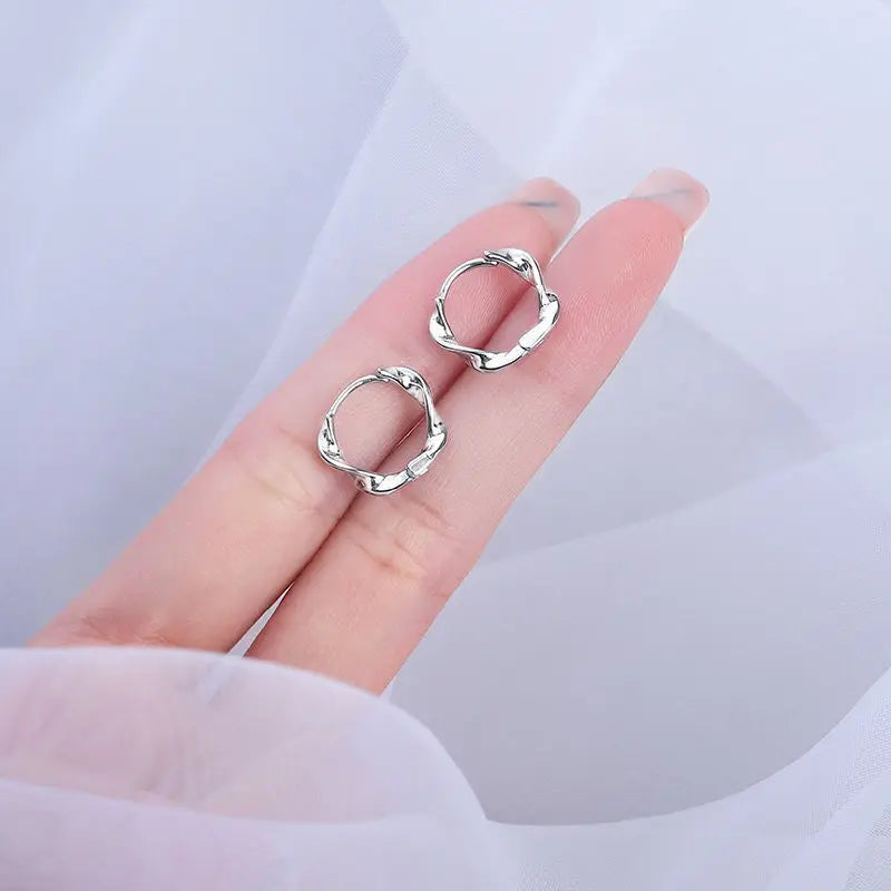 Silver Hoop Earrings | Trendy Distorted Round Earrings for Women detail view