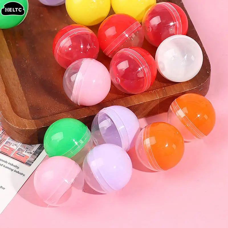 50pc Mini Clear Plastic Capsule Toy Surprise Balls | Gashapon Containers for Vending M close-up view
